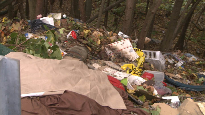 Piles of trash were found on this hillside and throughout the town.